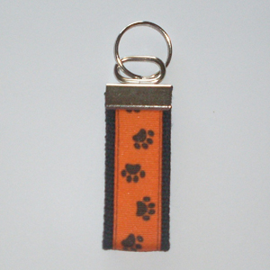 Pawprints on Orange Black Trim